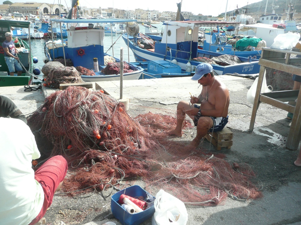 Mending nets in Favignana